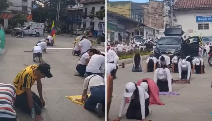 Os cristãos de joelhos nas ruas da Colômbia. (Foto: Reprodução/Instagram/TVO Xela)